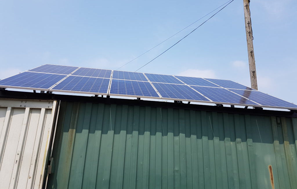 Installation of Solar Panels on Metal Container