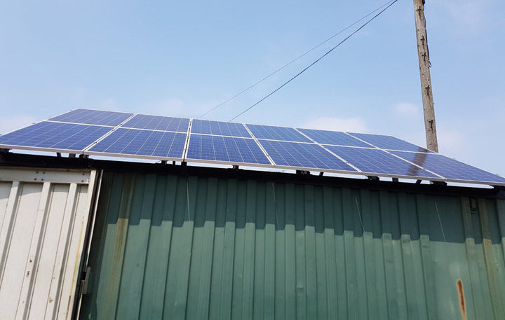 Installation of Solar Panels on Metal Container
