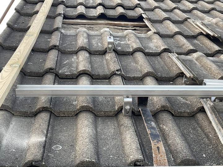 Installing solar panels on tiled roofs
