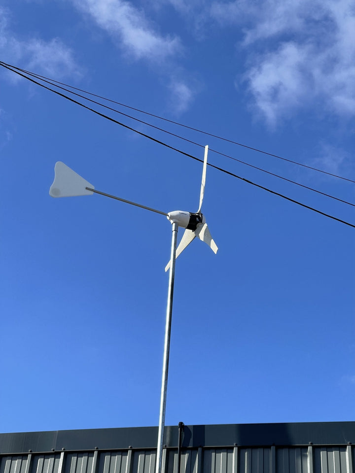 Installation of 1kW Wind Turbine on Metallic Building for Hybrid Electricity with Solar